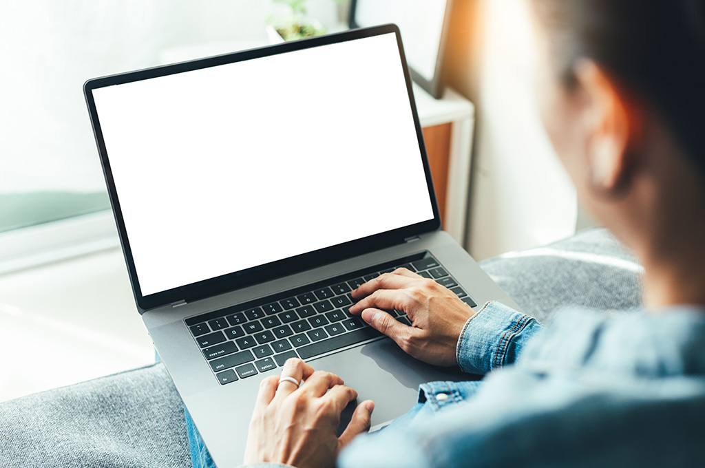 A veteran at home looking at a military divorce checklist.