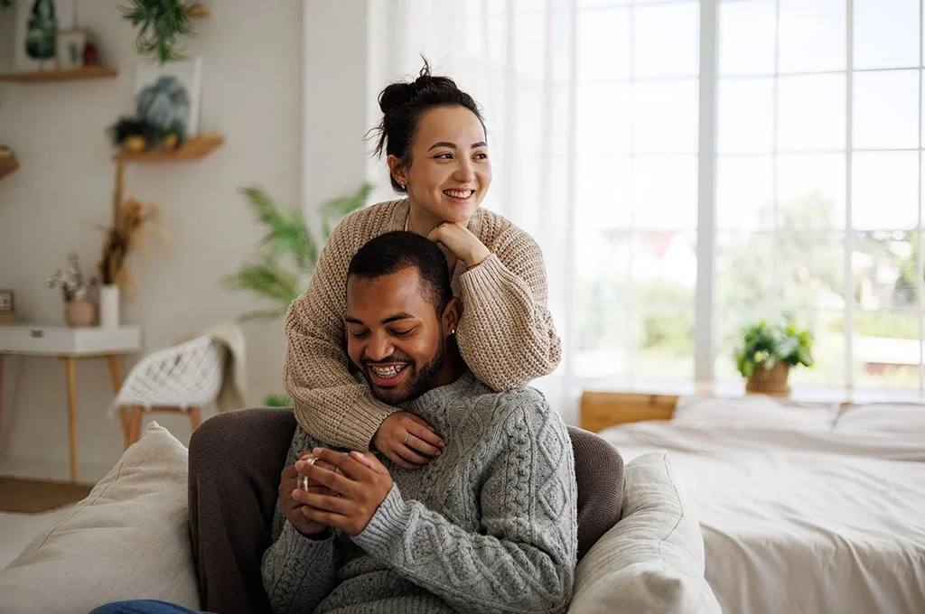 A disabled veteran and her husband share a moment at home exploring alternatives to bankruptcy