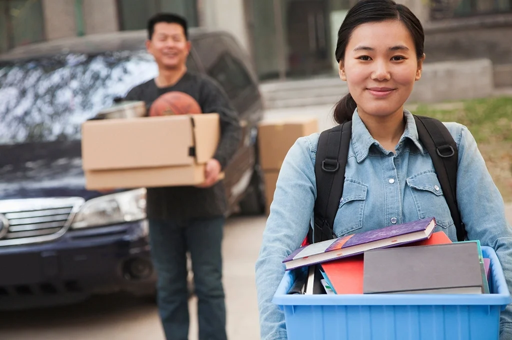 A veteran takes his daughter to college after using his VA education benefits eligibility