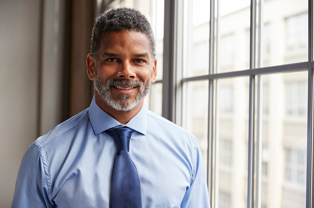 A veteran businessman running his company after finding business loans for veterans