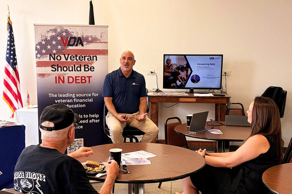 Retired U.S. Navy Chief Warrant Officer Angel Torres discusses financial wellness with veterans.