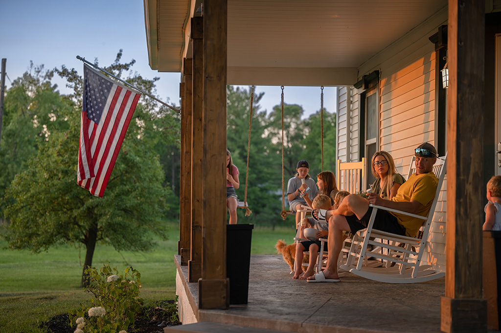 A veteran at home with his family after exploring debt help for veterans