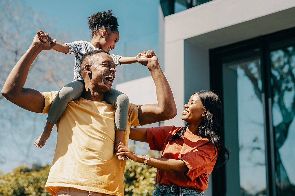 A veteran family at home with their daughter