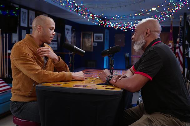 Two men in a podcast studio